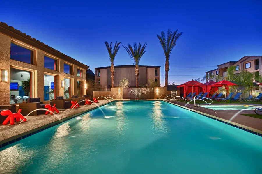 Avenue 25 apartment community pool at dusk, Phoenix, Arizona